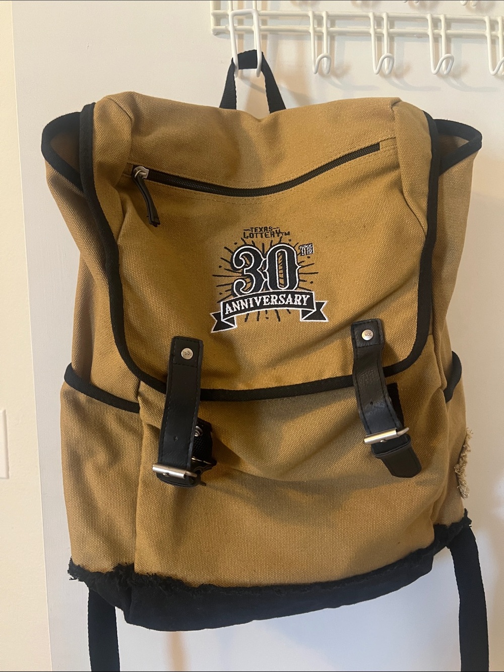 Tan Canvas Backpack with Black Trim